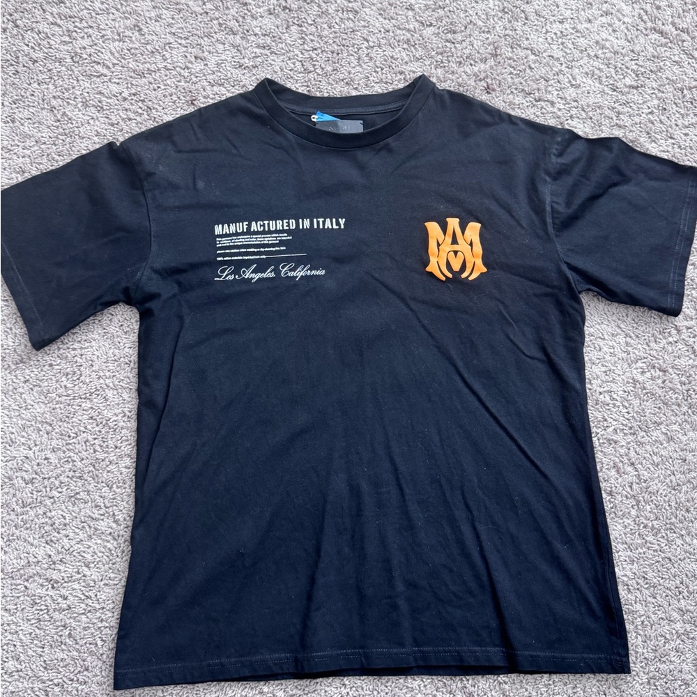 Black Graphic Tee with Orange Graphic Letters